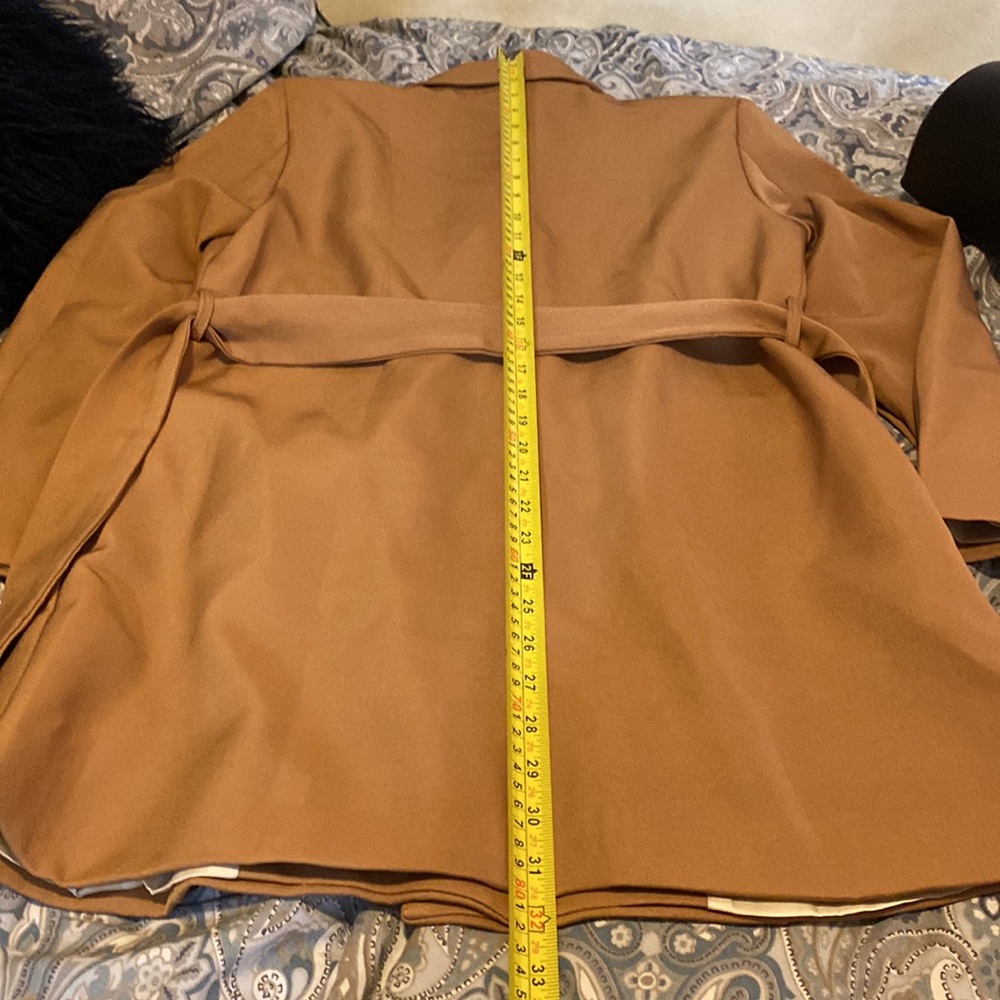 Like new.  Beautiful lined jacket in a a true camel color. Measurements in photo - Picture 8 of 9